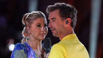 Beatrice Egli und Florian Silbereisen bei einem Auftritt - Foto: Imago Hofer