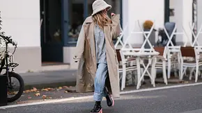 Frau mit Mantel, Hut, Pulli und Jeans - Foto: Jeremy Moeller/Getty Images Frau mit Mantel, Hut, Pulli und Jeans - Foto: Jeremy Moeller/Getty Images