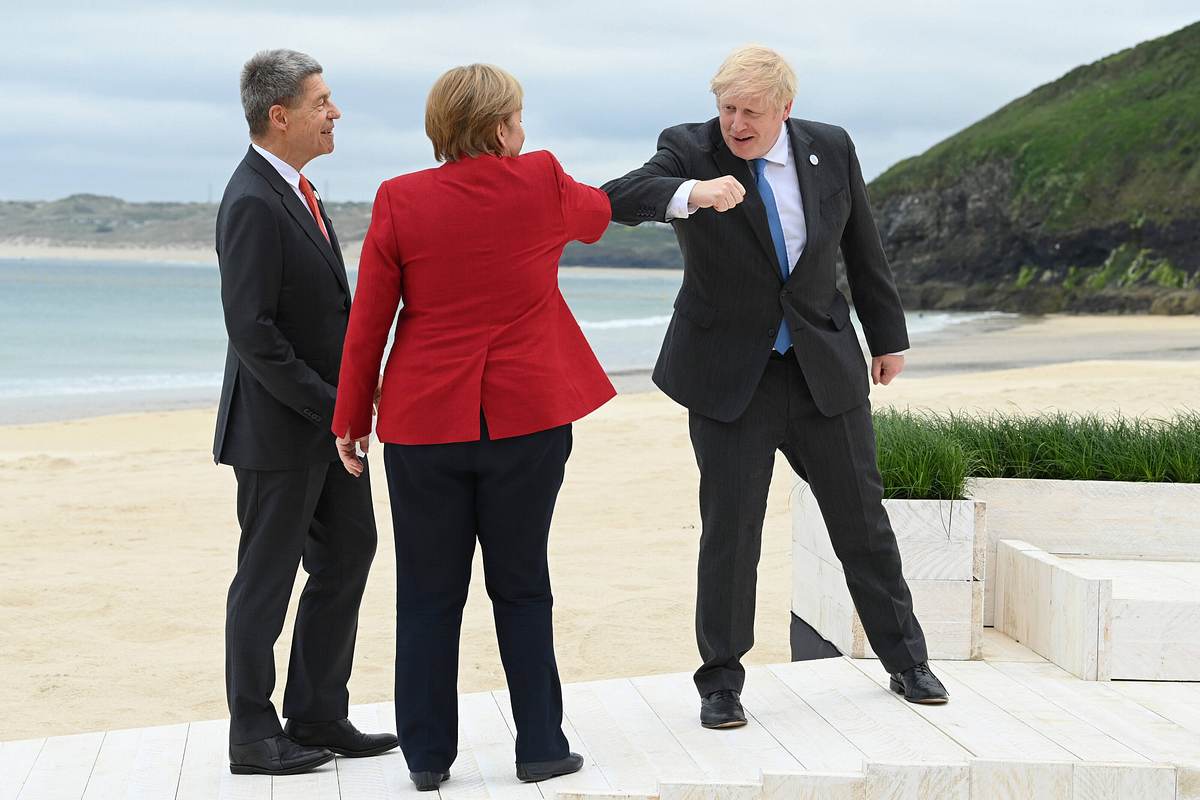 Sauer, Merkel und Boris Johnson.