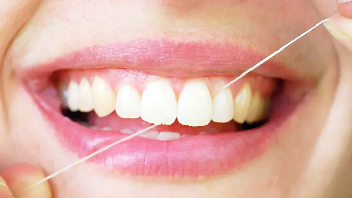 Was bringt Zahnseide wirklich? - Foto: iStock
