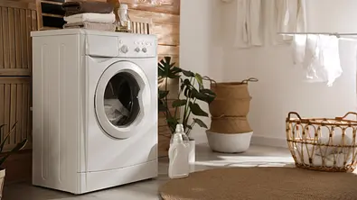 Waschmaschine mit Trockner - Foto: iStock/Liudmila Chernetska